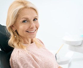 Woman smiling in the dental chair